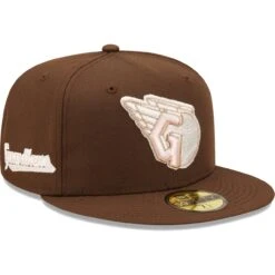 Men's Cleveland Guardians New Era Brown Pink Undervisor 59FIFTY Fitted Hat